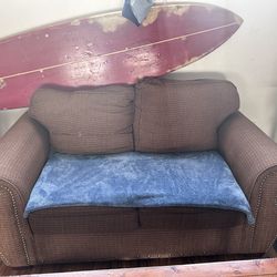 Brown loveseat