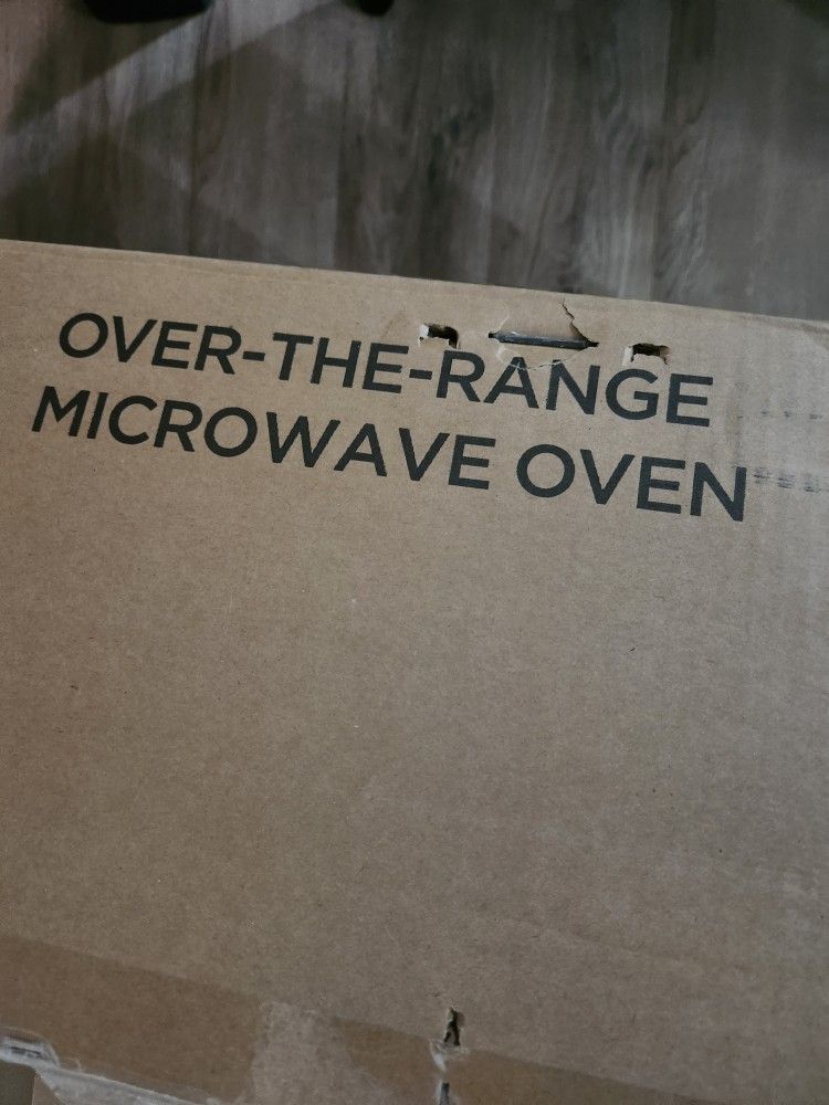 Brand NEW- OVER THE RANGE MICROWAVE 