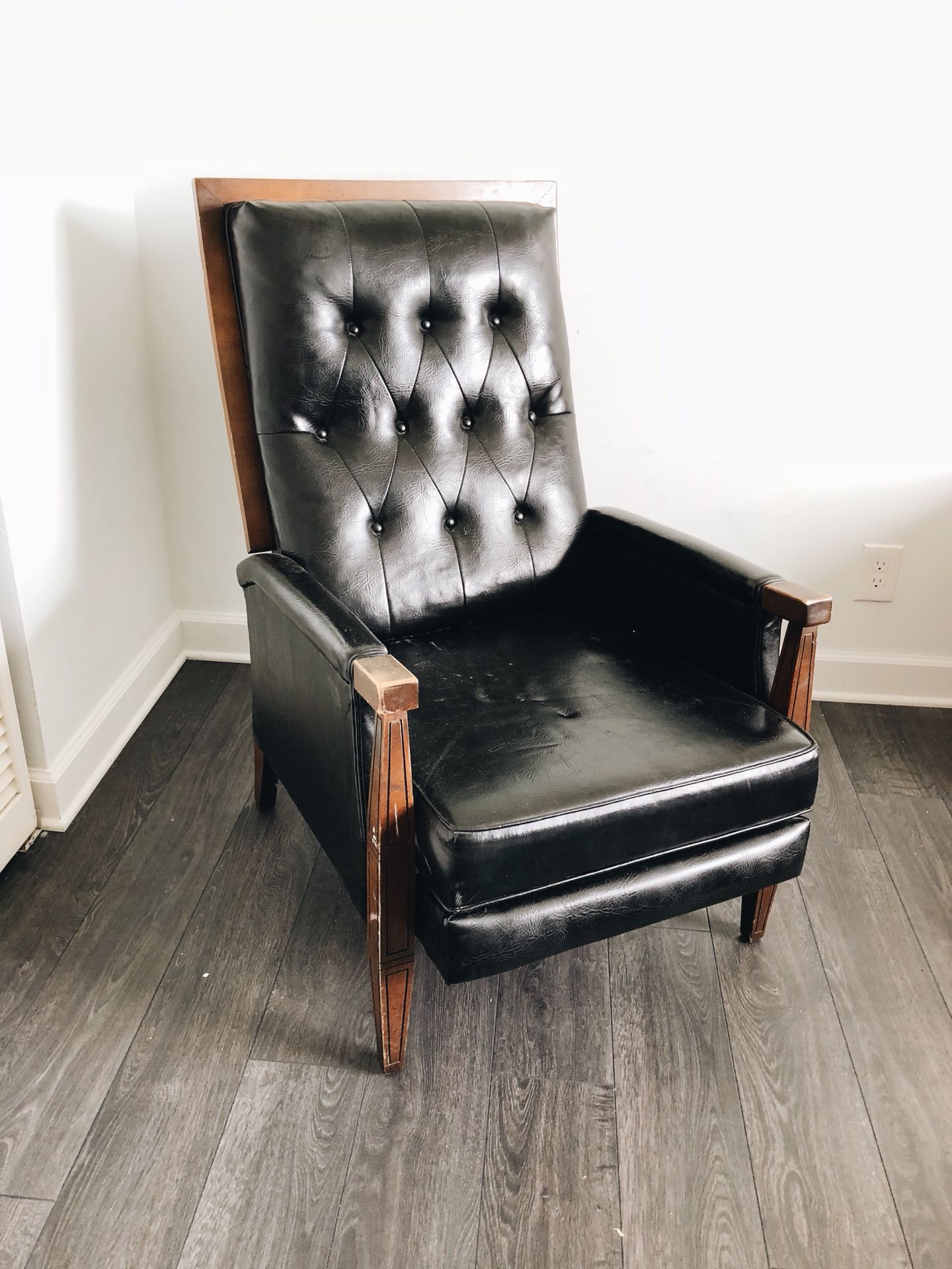 Vintage black leather recliner