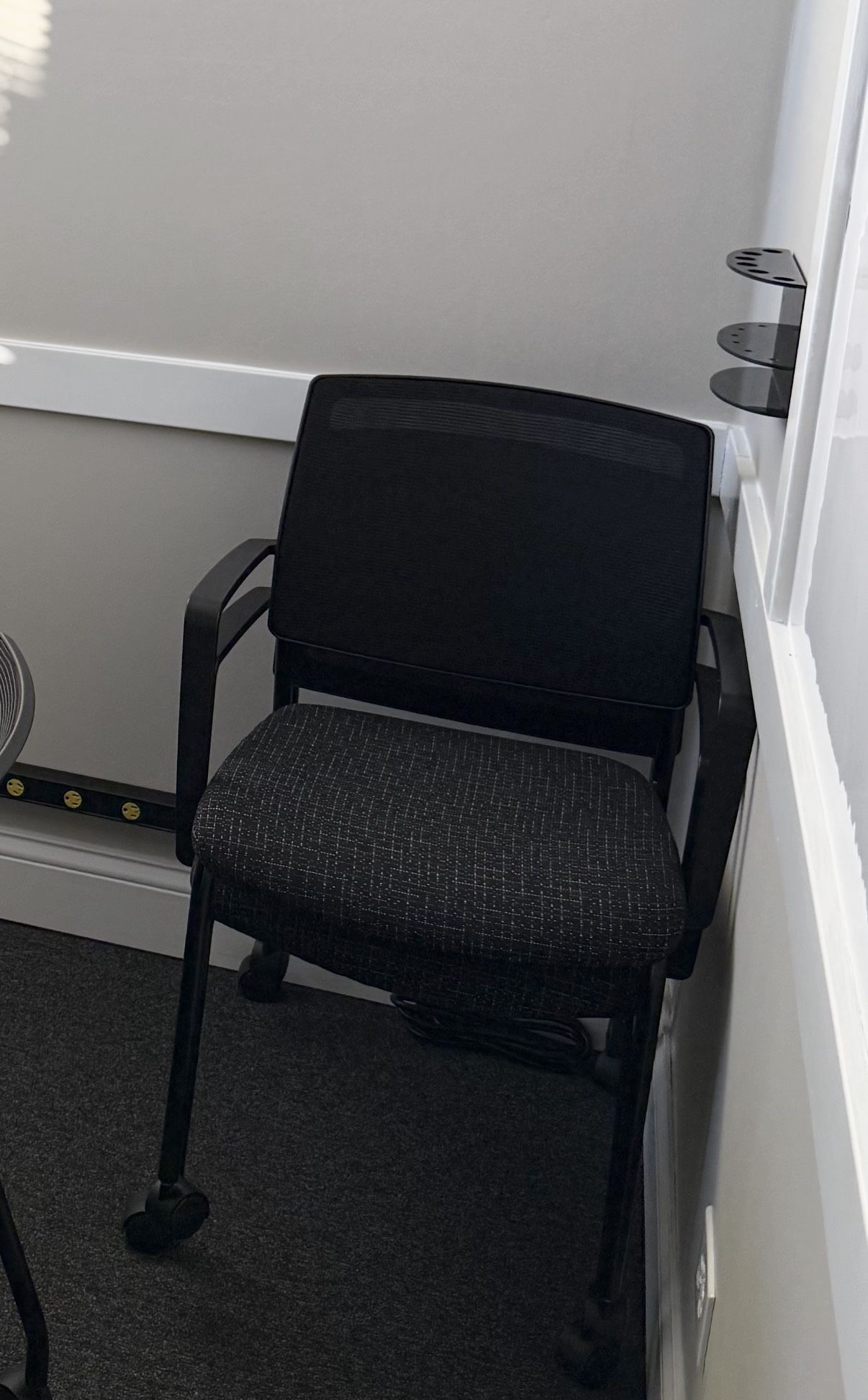 Black chairs with wheels