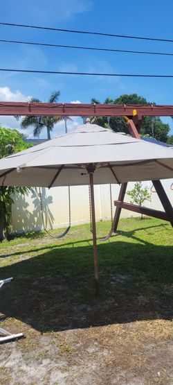 Wood umbrella. 12 ft diameeter h 8 ft