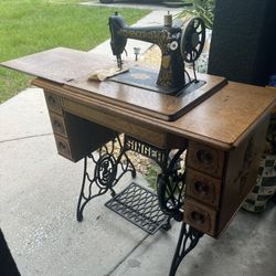 Antique Sewing Machine And Table 