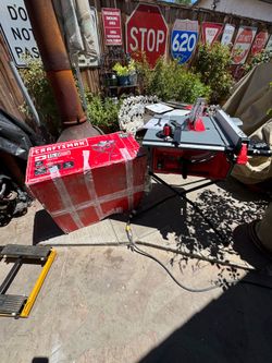 Craftsman table saw 10 inch 15 amp. With stand