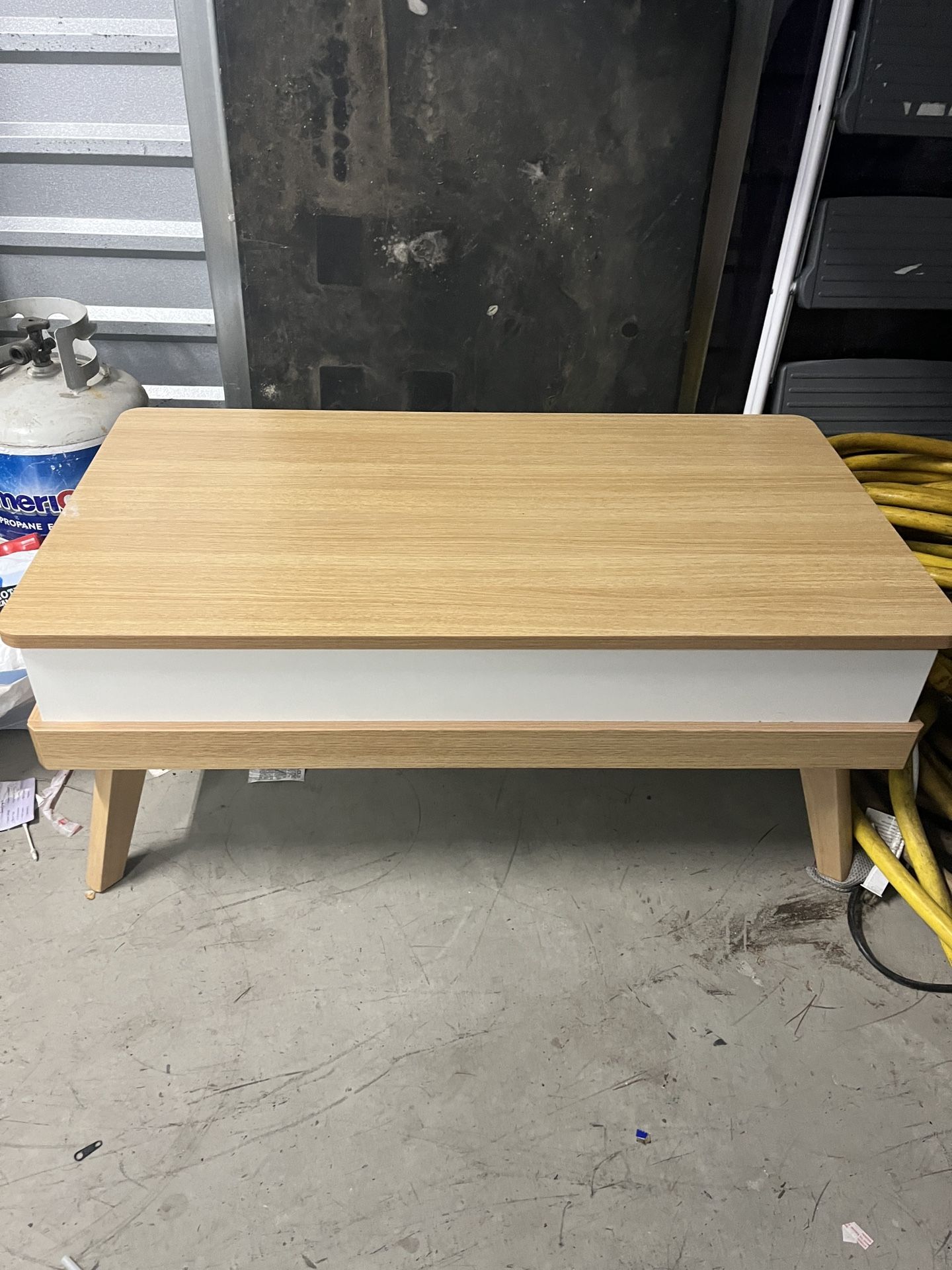 Coffee table with telescoping top