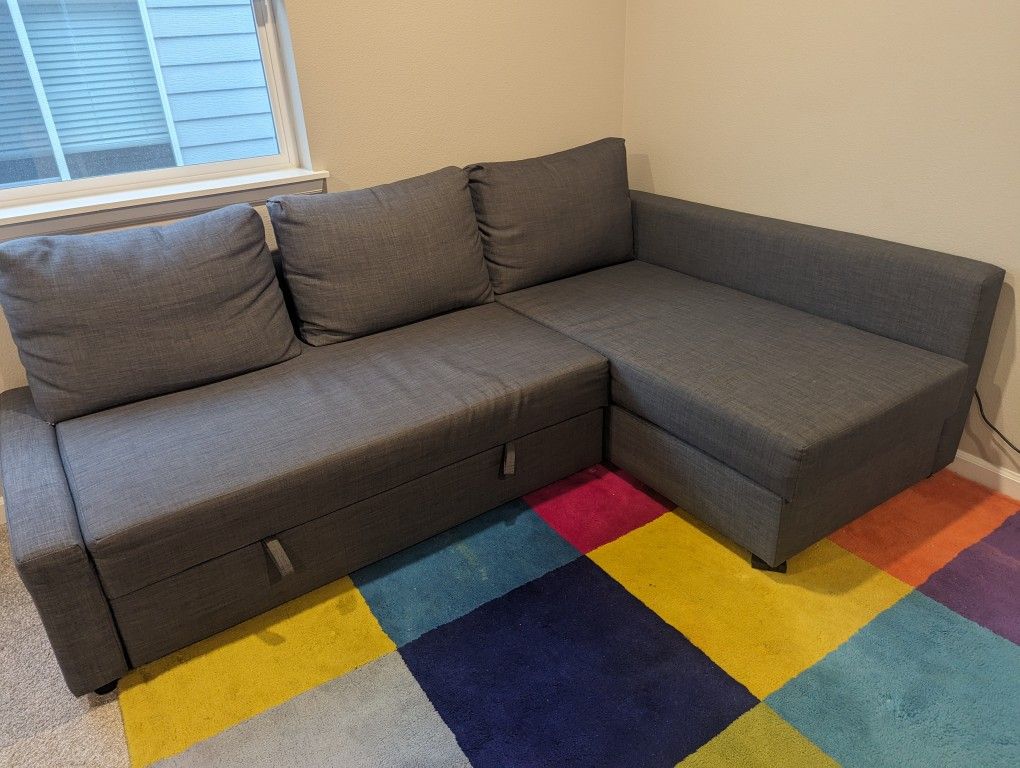 IKEA FRIHETEN 3 seat sectional
couch with storage and pull out couch, Dark Gray