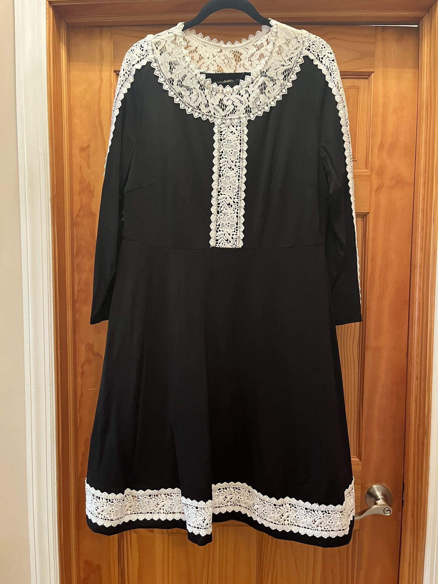 Brand new European dress for women. Lovey design. There is beading on top. Slip under the dress. Color black The dress size runs between 1-2xxl 