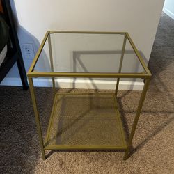 2 side tables, 2 tier accent tables or bed side tables. gold with tempered glass.