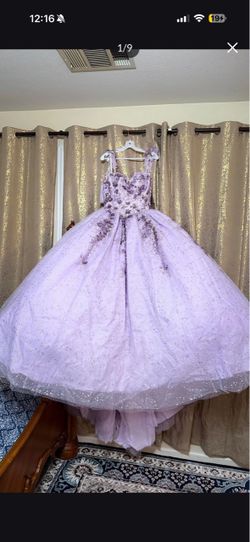 Beautiful light purple ball gown with matching crown, necklace, earrings, and bracelet for sale. Worn only once, in perfect like-new condition. Origin