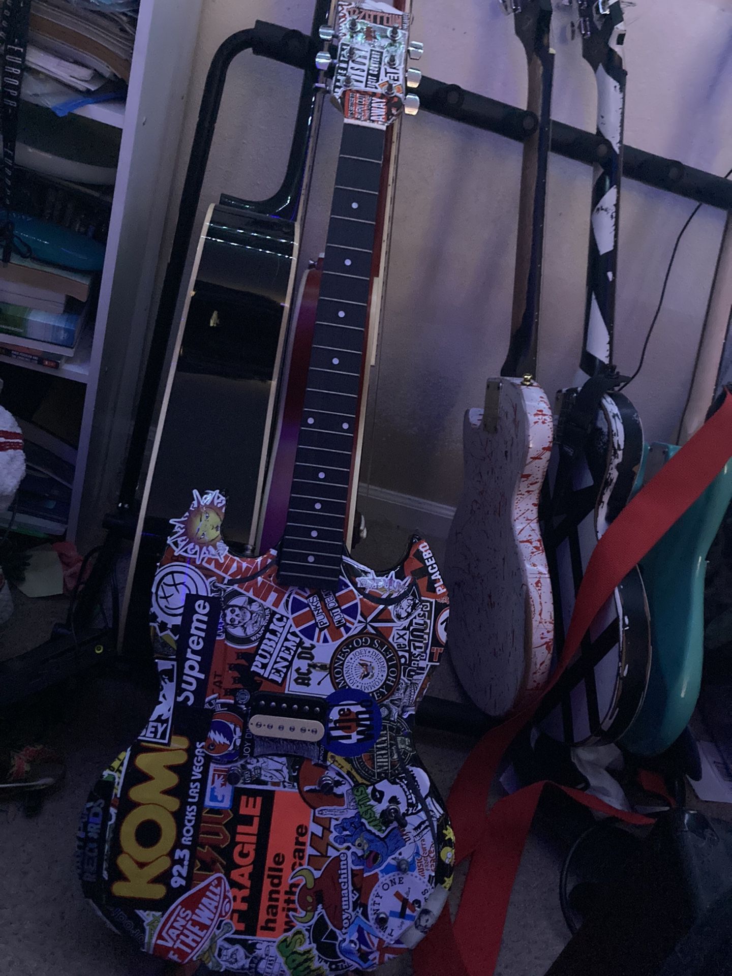 Sticker Bombed SG Guitar