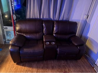 Brown leather double recliner