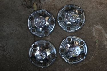 93 to 02 Dodge Ram 1500 Wheel Center Caps (Set of 4 USED)