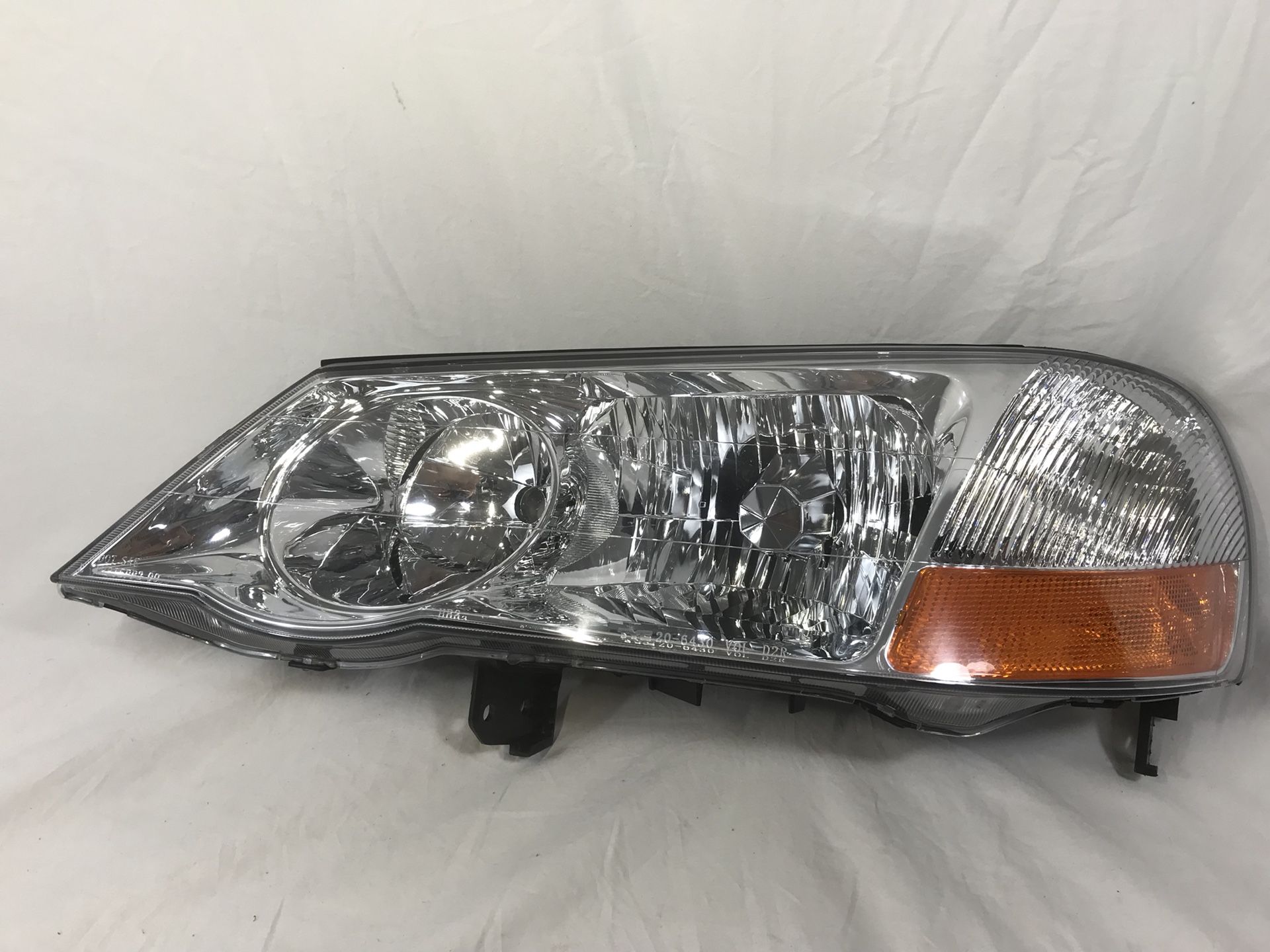 ACURA TL HEAD LIGHT BROKEN TAB