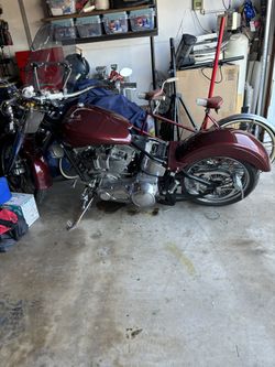 Special Construction Bike With A Revtek 100 Motor Good Condition Lots Of Chrome Runs. Lots Of Work Done To This Bike Has Two Fender Set UPS.