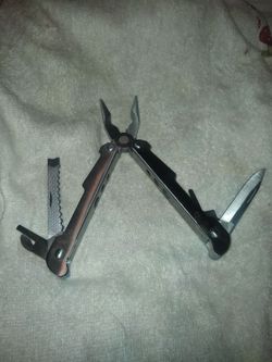 Multi use tool with plier