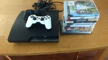PS3 with 2 controllers and games
