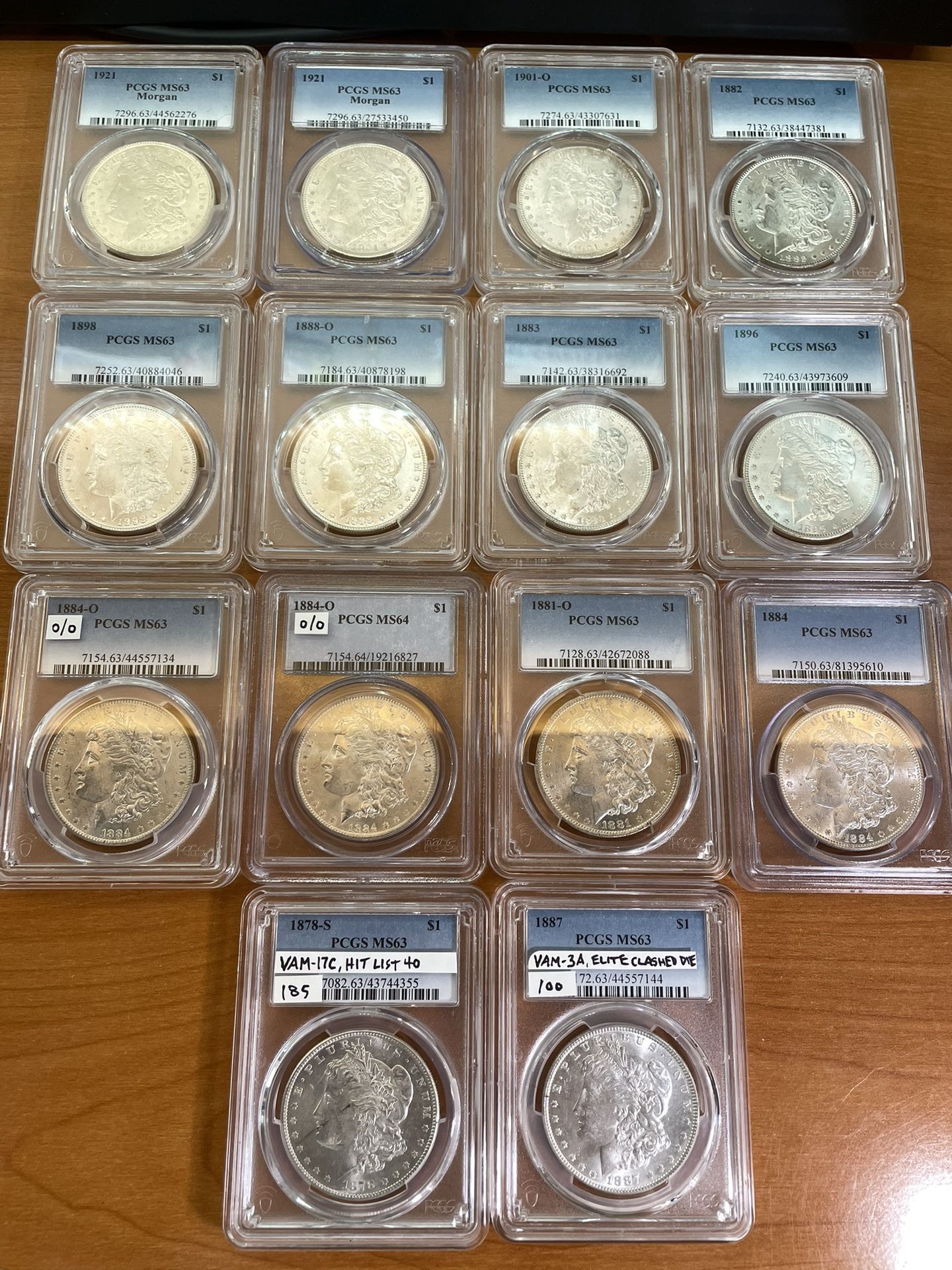 14 Morgan Silver Dollars - Uncirculated & Graded