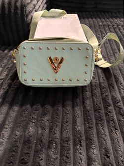 Women’s Valentino Orlandi Cross-body camera style bag.