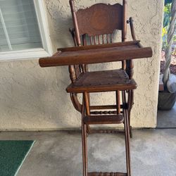 Antique Baby High Chair With Leather Seat and Goes  Into A Stroller with  Wheels