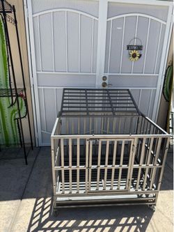 Large dog crate on wheels