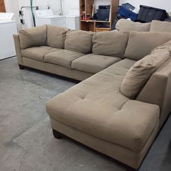 Large brown sectional couch