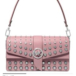 This MICHAEL Michael Kors Greenwich crossbody converts to a shoulder bag with its removable strap