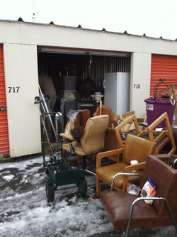 Brownish/ gold chair in middle