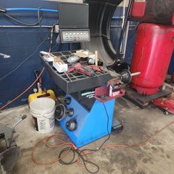 Tire Machine And Balancer.