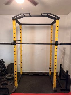 Power rack/olympic barbell/300lbs plates