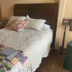 Dark wood queen size sleigh bed