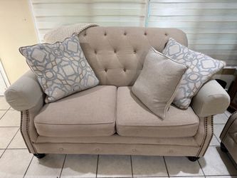 Ashley Beige Sofa & Loveseat set.