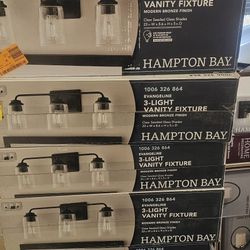 Hampton Bay
Evangeline 23 in. 3-Light Modern Bronze Farmhouse Bathroom Vanity Light with Clear Seeded Glass Shades
