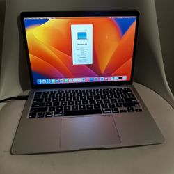 2020 Macbook 13 in with charger block 