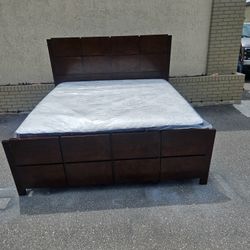 Brown King Size Solid Wood Bed Frame With Brand New King Size Plush Sealy Posture Pedic Mattress And Box Spring In Plastic 