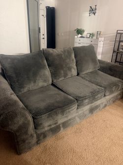 Grey couch with ottoman