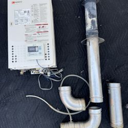Noritz tankless natural gas hot water heater, with vent pipe