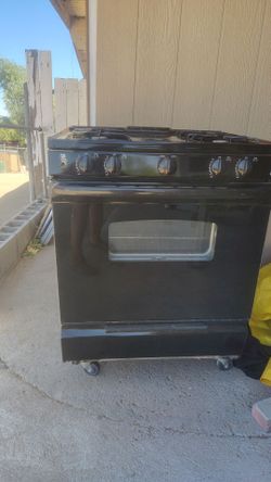 Estufa 4 quemadores todo horno funciona muy bien