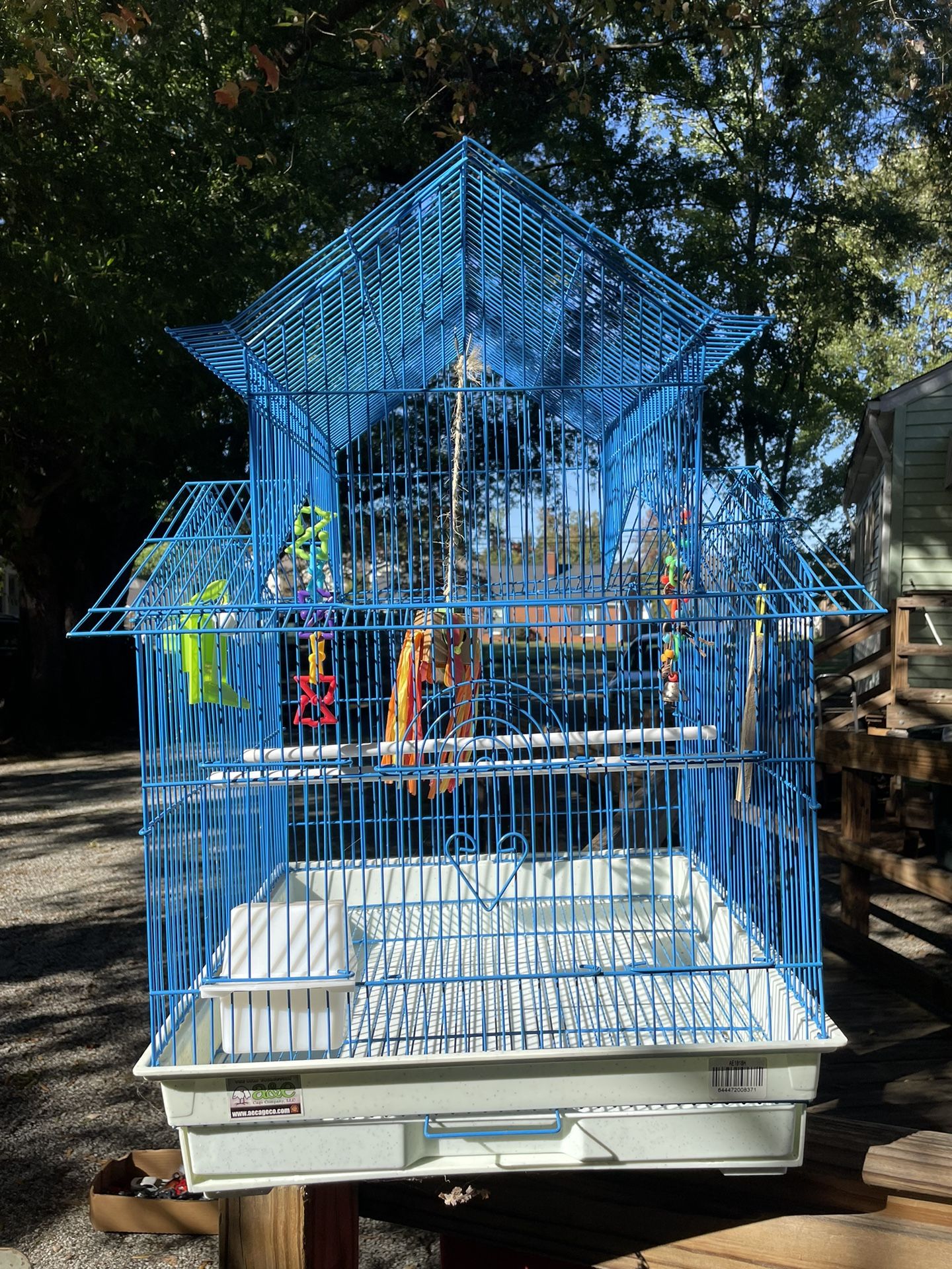 Bird Cage With Toys Also