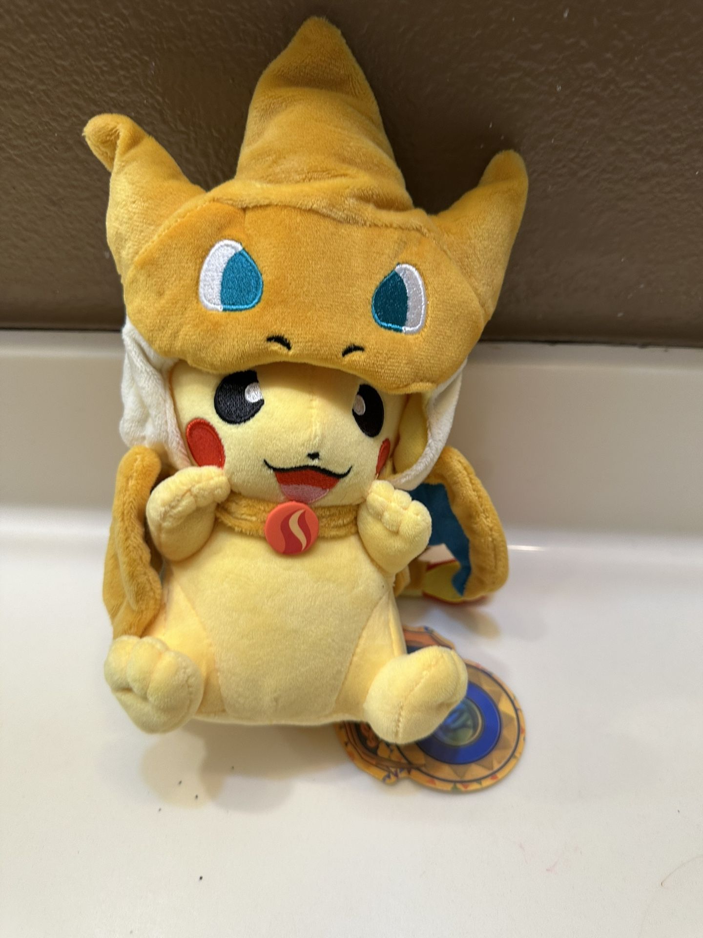 New Pikachu In A Mega Charizard Y Pancho Pokemon Plush