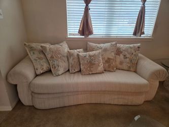 Curved Cream Fabric Sofa with Throw Pillows