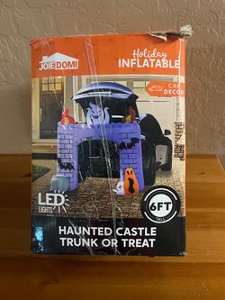 Inflatable haunted castle trunk or treat