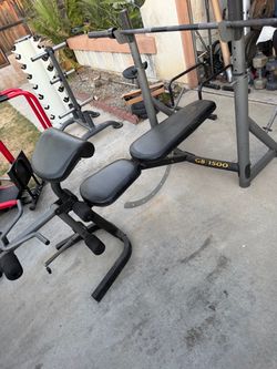 Very nice and strong Olympic weight bench with 7 ft Olympic bar.