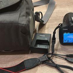Canon T5 camera with battery and charger 10 GB memory and carrying case