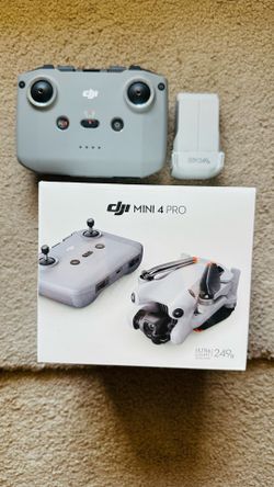 DJI MINI 4 PRO BRAND NEW REPLACEMENT SEALED BOX WITH USED DJI RC-2 CONTROLLER AND ONE USED BATTERY.
