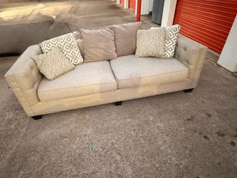Modern Beige Tufted Sofa with Accent Pillows – Excellent Condition