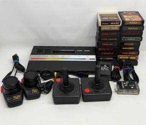 Atari 2600 jr with joysticks Paddles & 18 Games