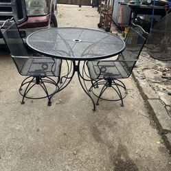 Wrought Iron Patio Set with 2 Swivel and Rock Chairs
