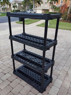 4 tier plastic shelf. 58H 36W 18D