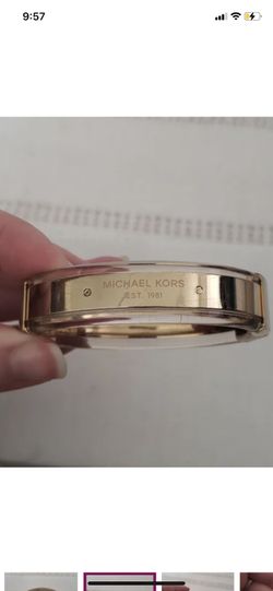 Michael Kors gold hinged bangle bracelet