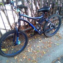 Boy's 24" aluminum Genesis full suspension mountain bike with front disc brake
