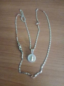 Cadena y virgen 14k ( hago prestamos de $$)